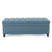 Noble House Juliana storage ottoman with beige upholstered top and birch wood legs, providing stylish storage and seating.