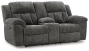 Signature Design by Ashley Frohn reclining living room set featuring plush sofas and loveseats with comfortable reclining features.