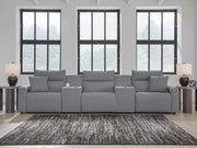 Signature Design by Ashley Modmax II reclining sectional in salt and pepper fabric, featuring plush cushions and reclining seats.