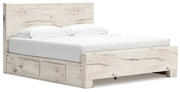 Signature Design by Ashley Lawroy panel storage bed featuring a wood finish, built-in storage drawers, and a modern design.