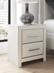 Zuraleus - Two Drawer Night Stand - R&R Furniture Gallery (Fountain Valley, CA)