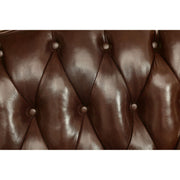 Dark oak FOA West Jericho Brown sofa with plush cushions and wooden legs, showcasing a modern living room setting.