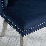 Blue FOA West Jewett dining chair with a sleek, modern design, shown from a side angle on a clean background.