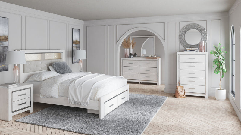 Signature Design by Ashley Altyra 7-piece bookcase bedroom set with matching storage and furniture pieces in a modern style.