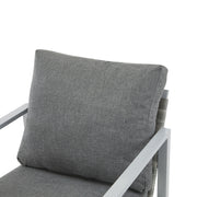 Modern Noble House lounge arm chair with rope accents and cushions, showcasing a stylish and comfortable seating design.