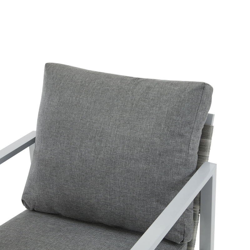 Modern Noble House lounge arm chair with rope accents and cushions, showcasing a stylish and comfortable seating design.