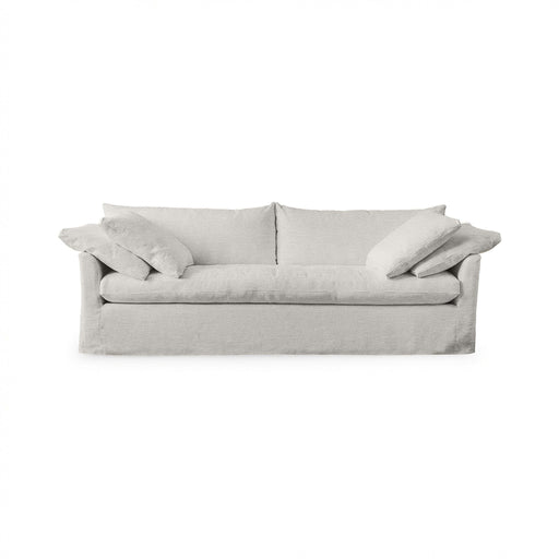 Classic Home Cassiano slip cover sofa in a neutral fabric, showcasing a stylish stationary sofa design with plush cushions.