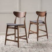 Noble House elegant counter height chair with cushioned seat and wooden legs, ideal for kitchen or bar area.