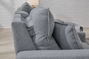 Signature Design by Ashley Modmax II reclining sectional in salt and pepper fabric, featuring plush cushions and modern design.