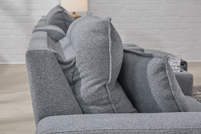 Signature Design by Ashley Modmax II reclining sectional in salt and pepper fabric, featuring plush cushions and modern design.