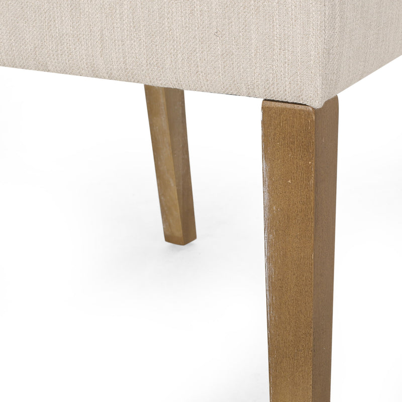 Contemporary Noble House dining chair with upholstered seat and tapered legs, part of a stylish chair set.
