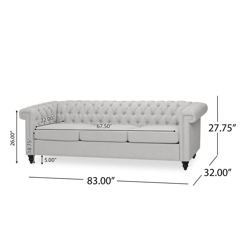 Noble House Chesterfield style 3-seater sofa with deep button tufting and classic stationary design, upholstered in rich leather.