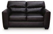 Midnight-colored Glennbre stationary loveseat by Signature Design Ashley, featuring plush cushions and a cozy, modern design.