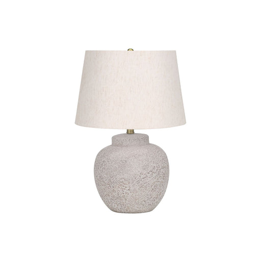 Modern cream concrete table lamp by 8th Street with a sleek, minimalist design and a cylindrical shape.
