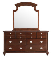 Elegant traditional dresser by Glory Furniture with polished wood finish and classic design, featuring multiple drawers and ornate details.