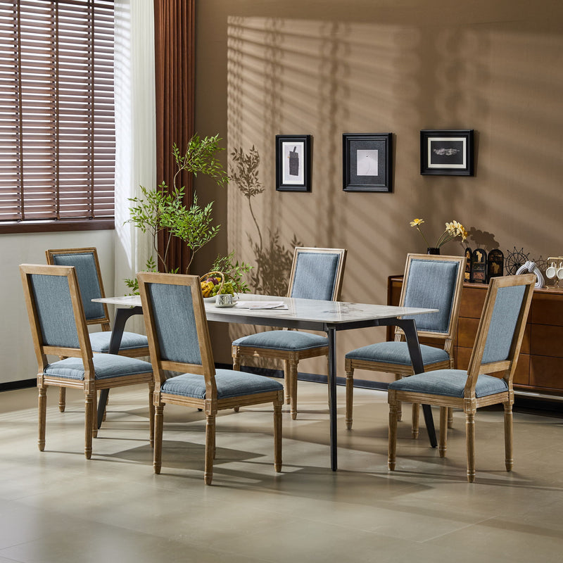 French Country Style Dining Chair With Upholstered Seating And Fluted Legs - R&R Furniture Gallery (Fountain Valley, CA)