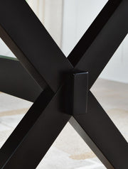 Wildenauer Signature Design by Ashley dining room extension table with a sleek counter table design and wooden finish.