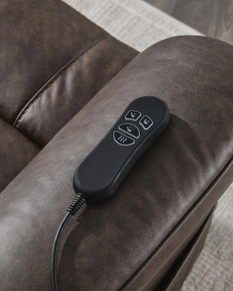 Signature Design by Ashley Oatman Power Lift Recliner in beige fabric, showing a plush, padded lift chair with armrests and reclining feature.