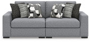 Benchcraft® Bealton stationary sectional sofa with plush cushions and fabric upholstery in a cozy living room setting.