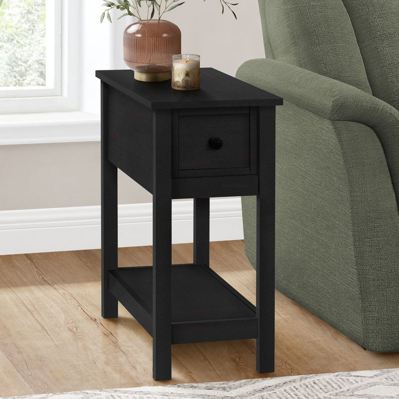 8th Street accent end table with two tiers, narrow design, lamp, storage drawer, and charming style in a modern living space.