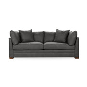 Classic Home Audrey stationary sofa with plush fabric and elegant design, shown in a living room setting.