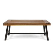 Noble House Carlisle industrial coffee table with slat panel design in natural wood finish, showcasing sturdy build and modern style.