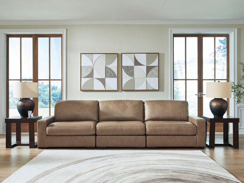 Benchcraft Veronella stationary sectional with plush fabric upholstery and modern design, featuring multiple seating sections and cushions.