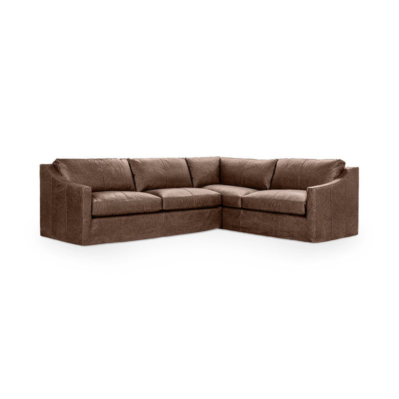 Comfortable Kipton upholstered corner sectional sofa by Classic Home, featuring plush cushions and modern design in a cozy living room setting.