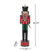 Noble House classic nutcracker holiday decor in green and red, showcasing a festive Christmas figure with intricate details.
