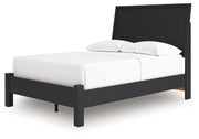 Signature Design by Ashley Danziar panel bed with low footboard, showcasing a sturdy wooden frame and modern design.