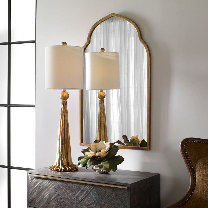 Uttermost Kenitra arched mirror with a sleek frame, showcasing a stylish and elegant design for modern home decor.