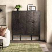 Classic Home Amilio Tall Cabinet in Rust Noir showing a sleek, modern accent cabinet with a smooth finish and tall storage design.