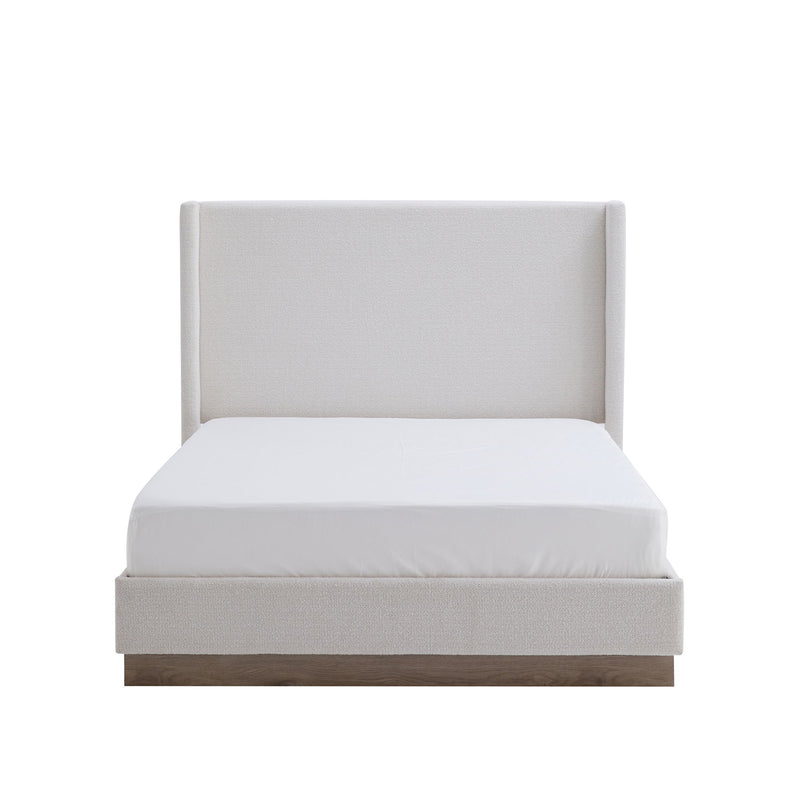 House & Home Furniture Hale upholstered wingback bed with padded headboard and fabric upholstery in a cozy bedroom setting.