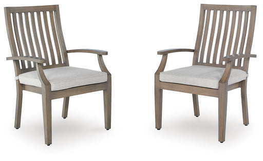 Set of two brown and beige Rainier Ranch arm chairs with cushions by Signature Design Ashley, showcasing stylish and comfortable seating.