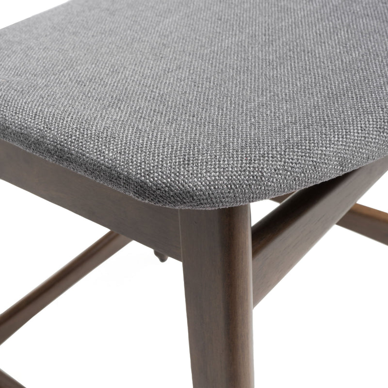 Noble House elegant counter height chair with cushioned seat and wooden frame, showcasing a stylish and comfortable design.