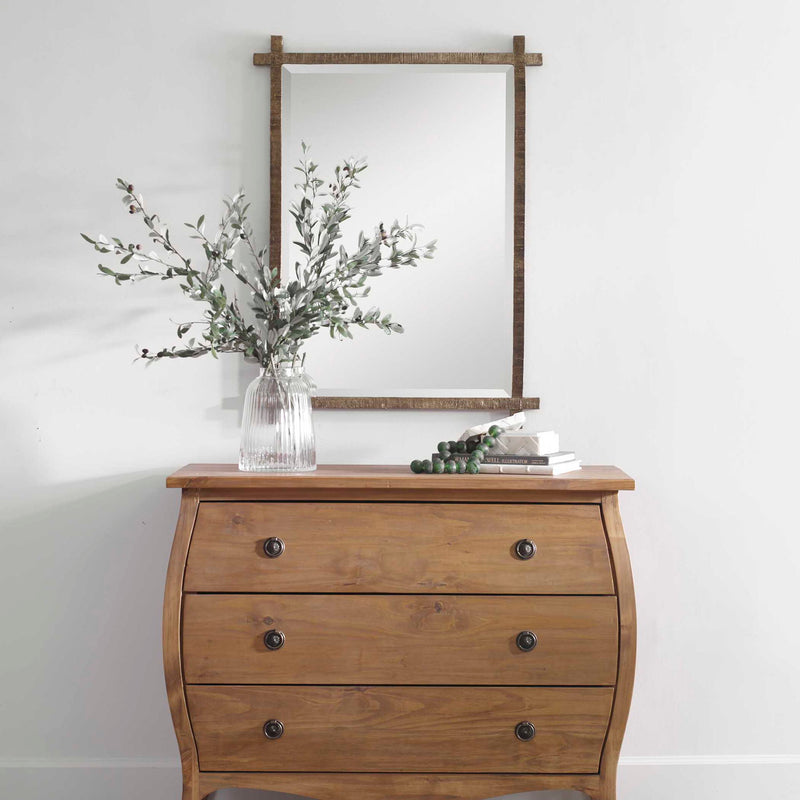 Uttermost Abanu ribbed dressing vanity mirror with a sleek, modern design, showcasing its textured, ribbed frame.