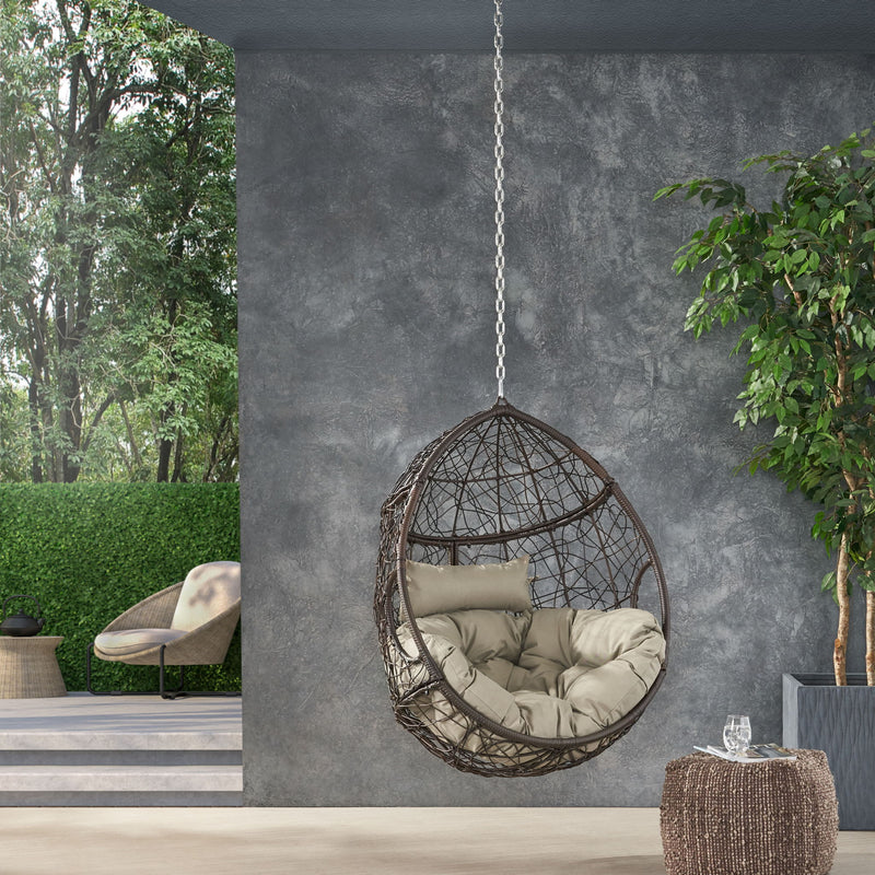 Noble House teardrop hanging chair with 8ft chain, cozy outdoor hammock seat with cushion and sturdy support.