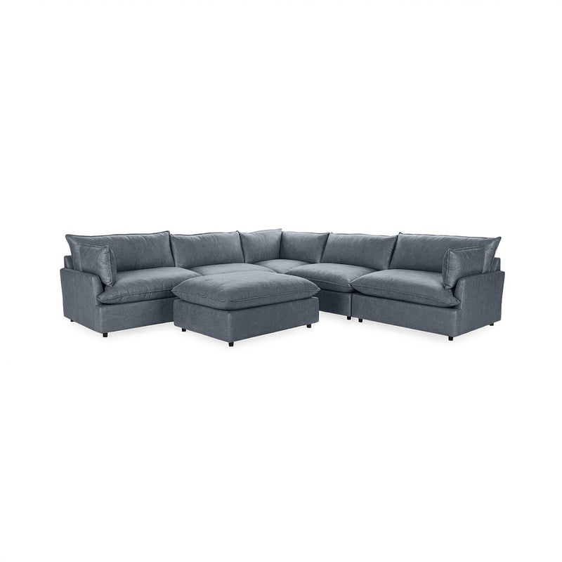 Classic Home Caplan 6-piece modular sectional with ottoman, featuring plush fabric cushions and versatile living room setup.