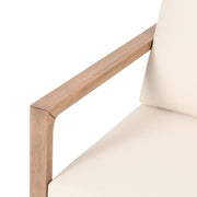 Noble House 4-piece acacia wood outdoor patio furniture set with soft cushions, includes coffee table and porch chairs in brown wash and beige.