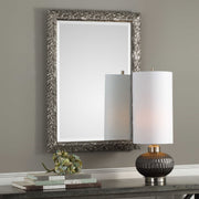 Uttermost Evelina Leaves Silver Wall Mirror with intricate leaf design and oval shape, decorative silver finish.