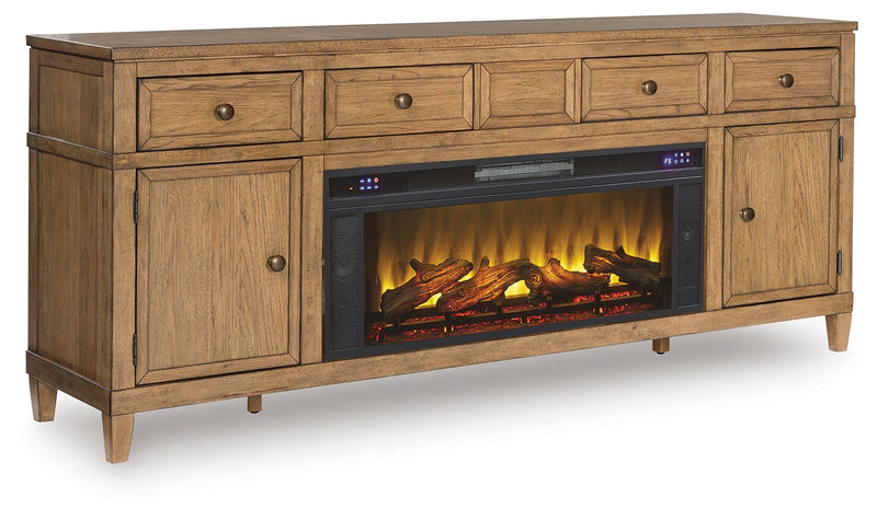 Signature Design by Ashley Sharlance 81-inch TV stand with electric fireplace, wood finish and modern storage compartments.