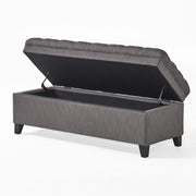 Juliana storage ottoman by Noble House with birch wood legs, upholstered in neutral fabric, showing a soft, plush seating surface.