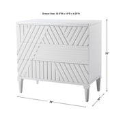 Uttermost Colby Drawer Chest in a natural wood finish with sleek metal handles, designed as an elegant accent chest.