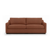 Classic Home Aspen stationary sofa with plush cushions and elegant design, shown in a cozy living room setting.