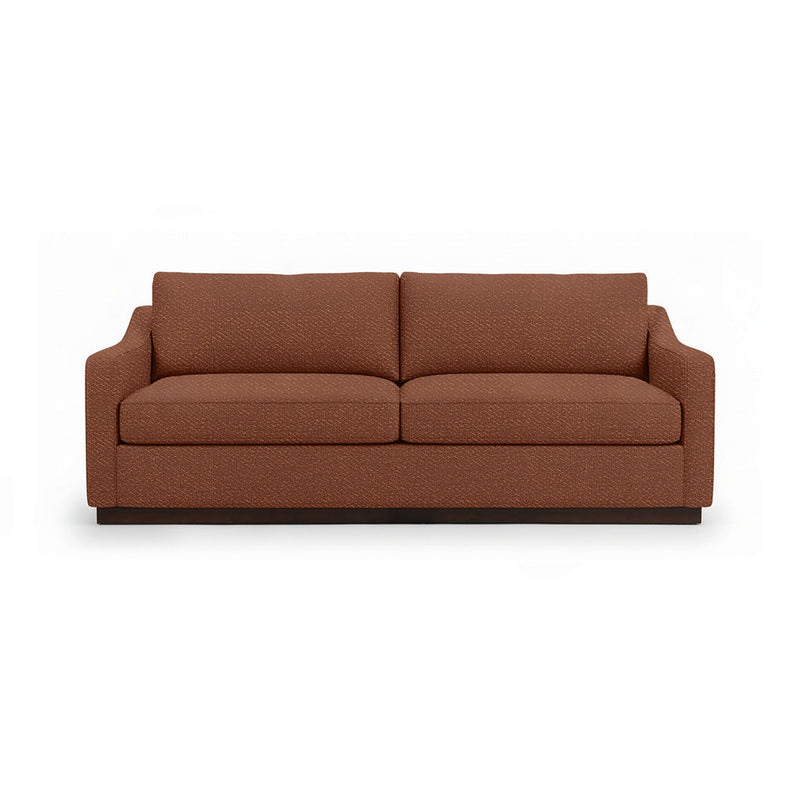 Classic Home Aspen stationary sofa with plush cushions and elegant design, shown in a cozy living room setting.