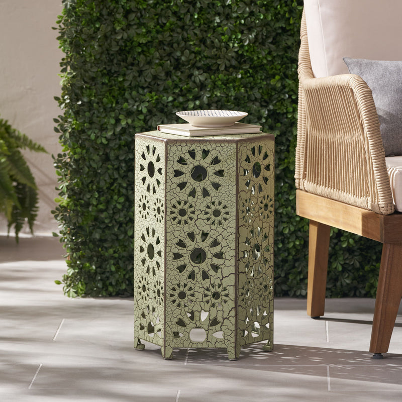 Noble House Eliana side table with a sleek wooden top and metal frame, modern design, placed next to a cozy armchair.