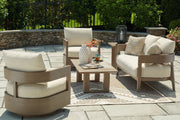 Signature Design by Ashley Serene Bay outdoor lounge set with five pieces, including cushioned chairs and a table for patio relaxation.