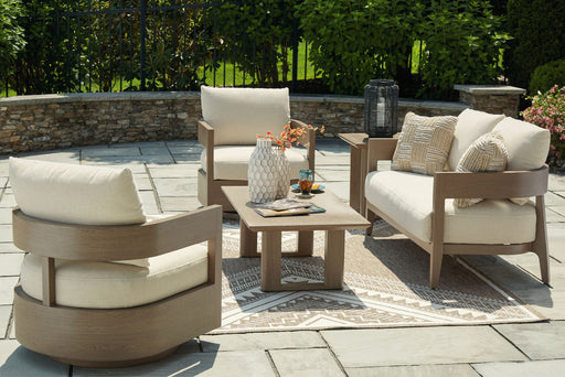 Signature Design by Ashley Serene Bay outdoor lounge set with five pieces, including cushioned chairs and a table for patio relaxation.