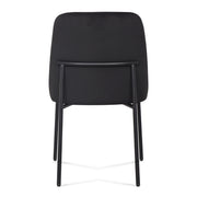 Set of two TOV Furniture Sydney dining chairs with sleek modern design, featuring light-colored upholstered seats and wooden legs.
