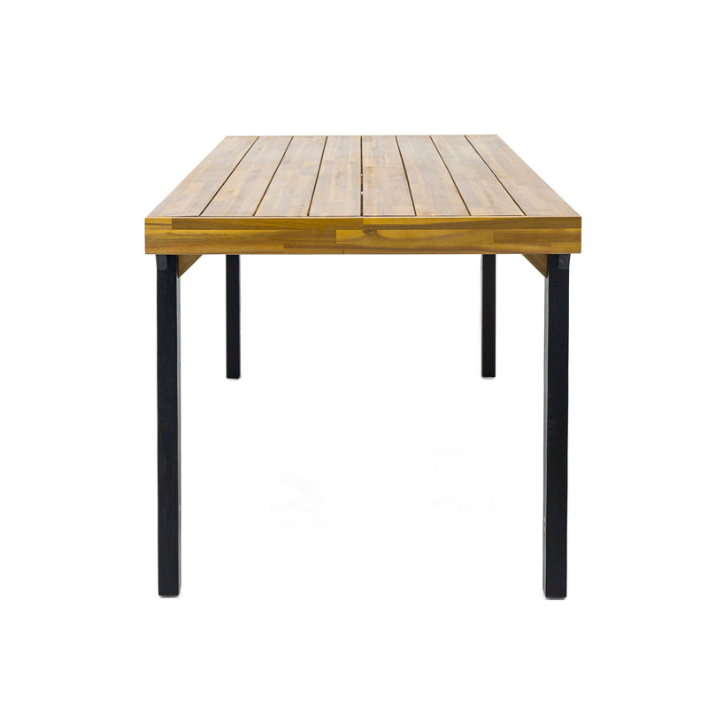 Rectangular acacia wood patio dining table by Noble House, 69 inches long, with black legs and teak finish for outdoor dining.